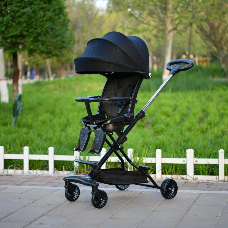 Cochecito de bebe plegable negro con capota y manillar reversible